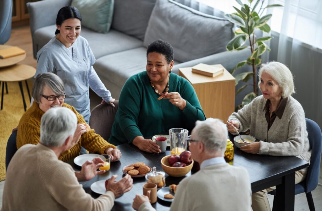 A group of seniors gathering for breakfast in an assisted living community, benefiting from the nutritious meals provided